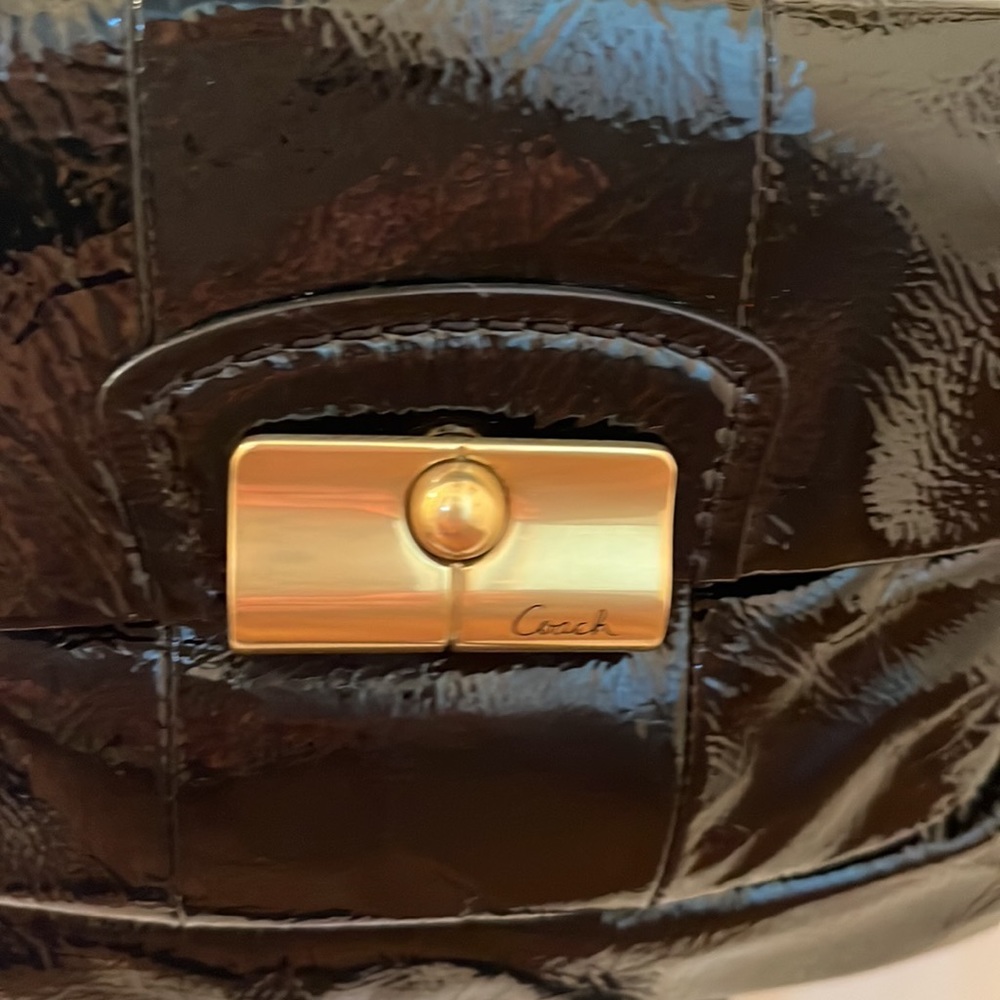 Perfect shape coach patent leather bag/carried 2 times